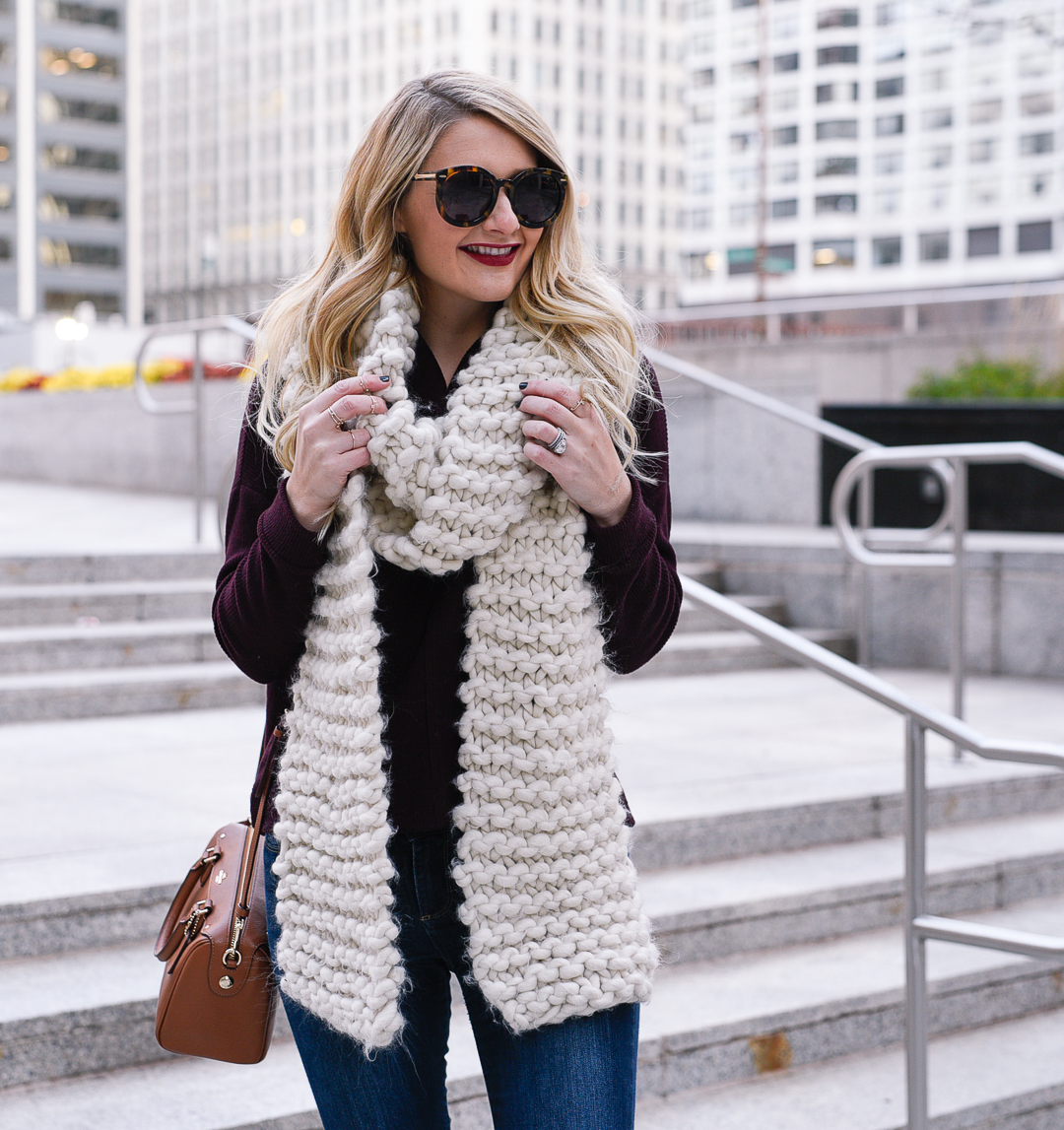 Urban Outfitters white knit scarf and Karen Walker Number One sunglasses. 