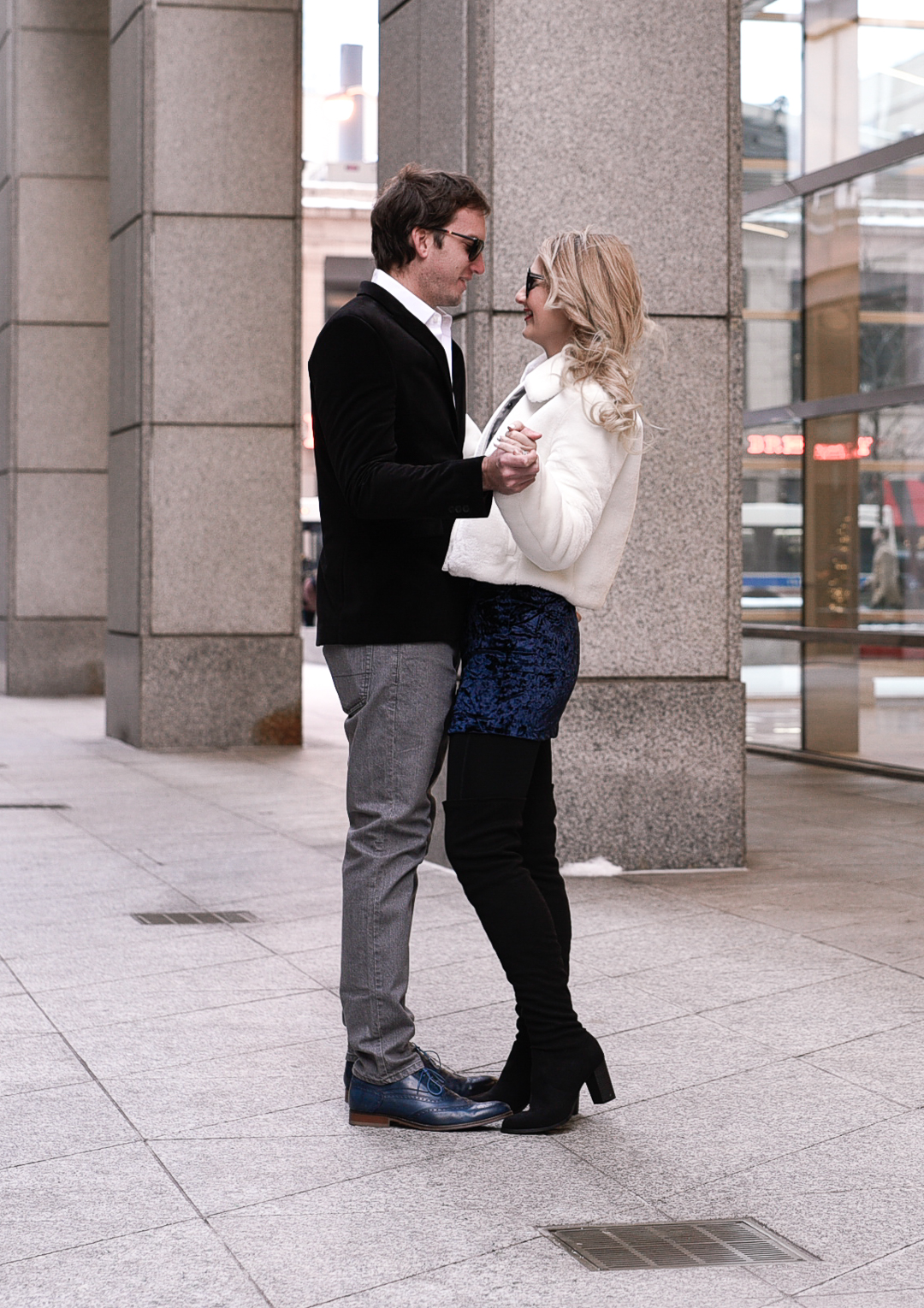 Husband and wife dancing in the streets. 