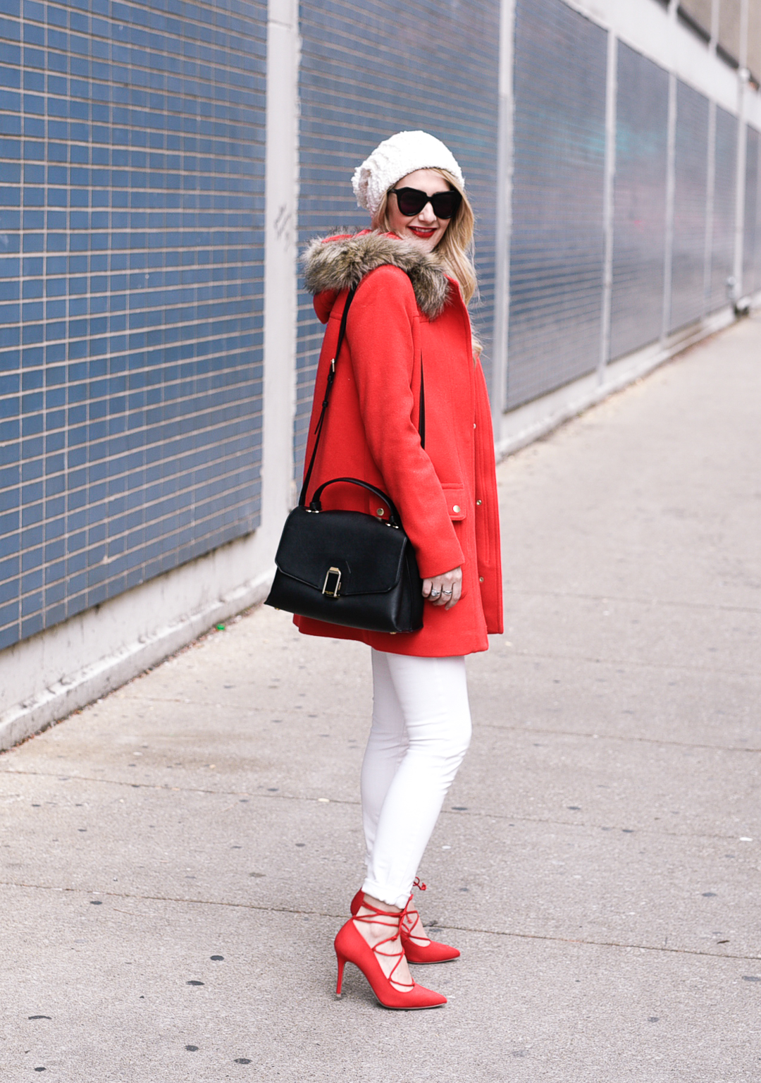 A holiday party look with pants and statement heels. 