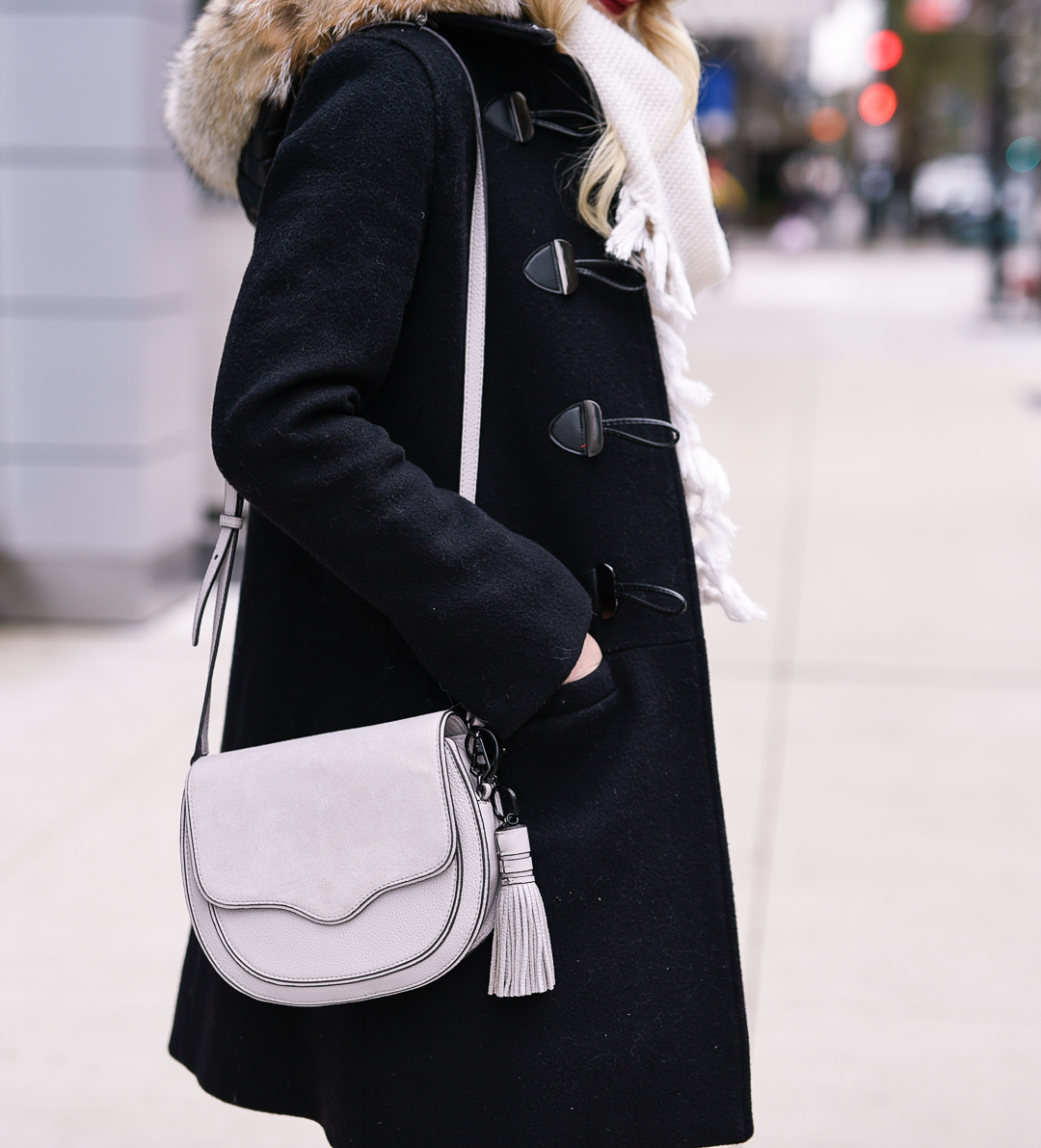 Jenna Colgrove wearing the grey Rebecca Minkoff Suki crossbody bag. 