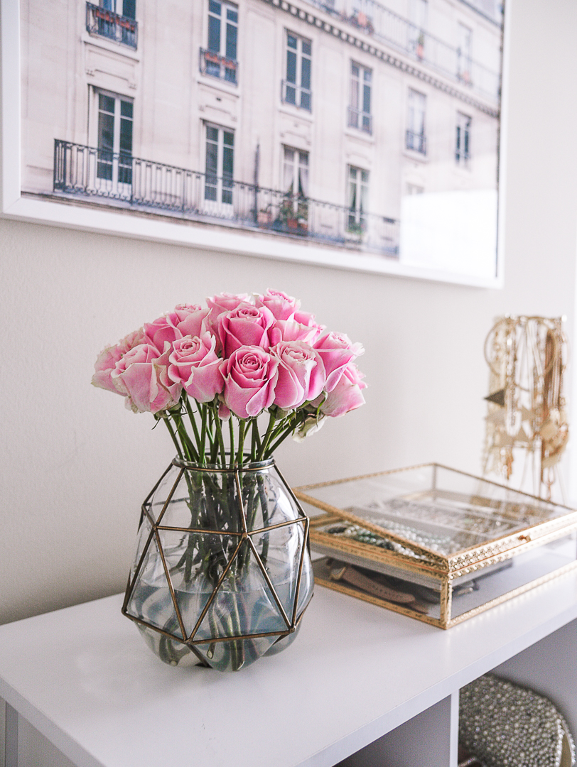 West Elm vase and Trader Joe's pink roses. - Second Bedroom Ideas with Havenly and Pier 1 by Chicago style blogger Visions of Vogue