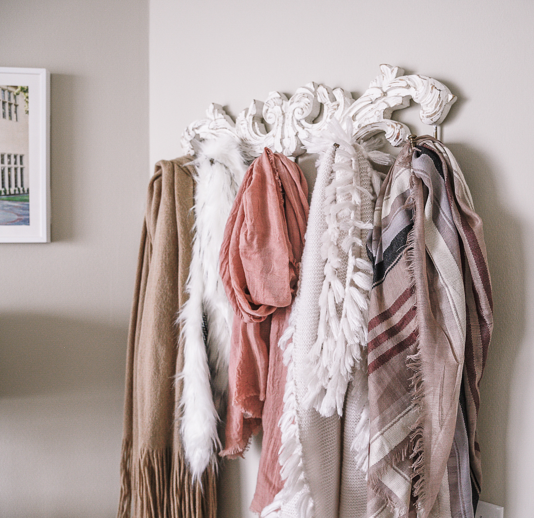 Anthropologie scarf hander and pink and beige scarves. - Second Bedroom Ideas with Havenly and Pier 1 by Chicago style blogger Visions of Vogue