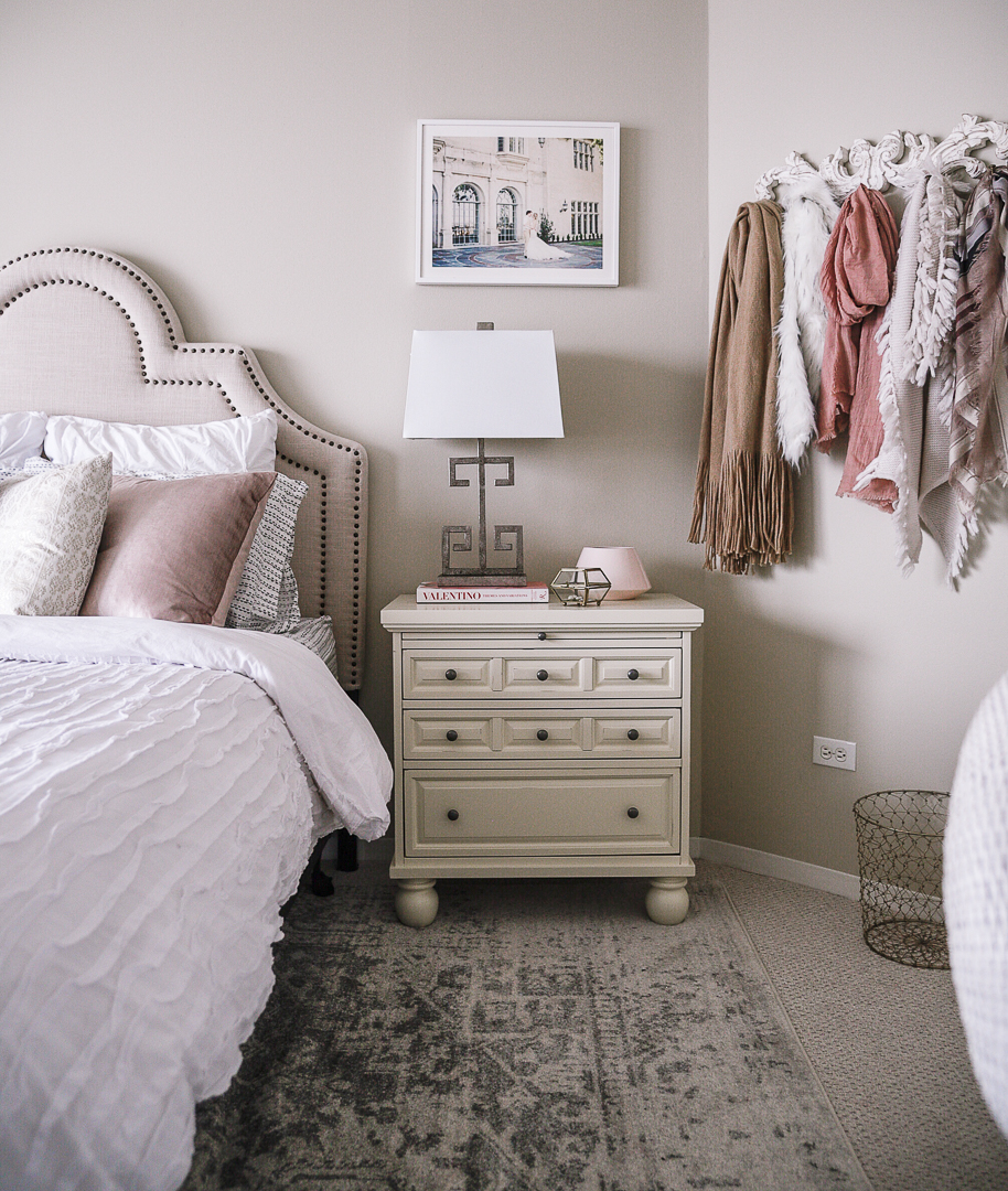 A nightstand with plenty of drawers and a statement lamp. - Second Bedroom Ideas with Havenly and Pier 1 by Chicago style blogger Visions of Vogue