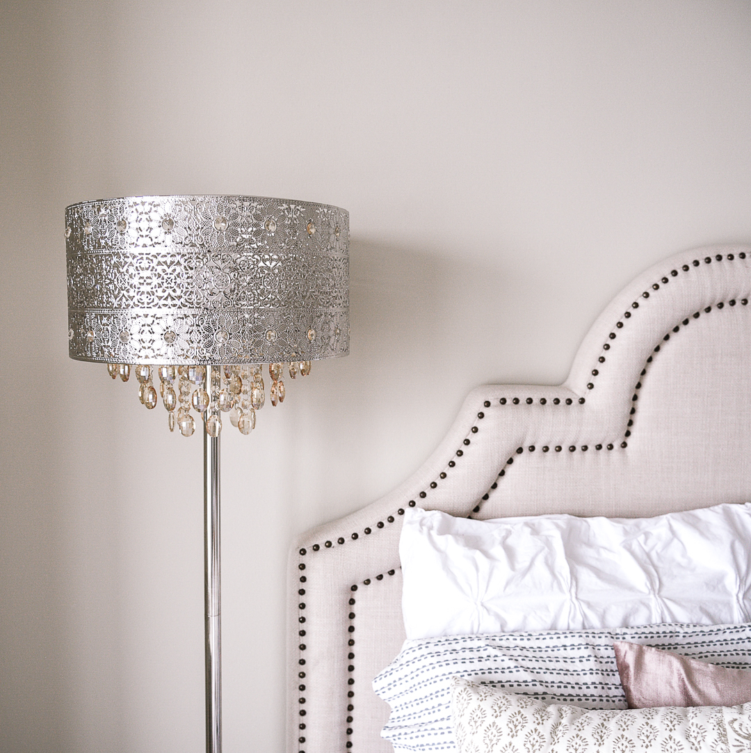 A bohemian glam floor lamp. - Second Bedroom Ideas with Havenly and Pier 1 by Chicago style blogger Visions of Vogue