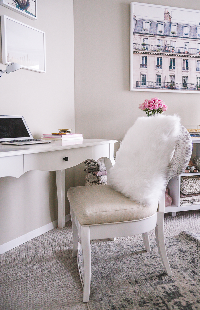 A white scalloped desk and a fur pillow. - Second Bedroom Ideas with Havenly and Pier 1 by Chicago style blogger Visions of Vogue