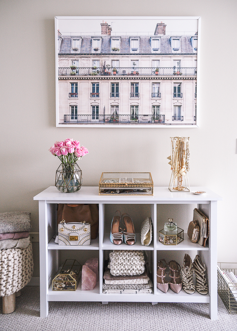 Girly bookshelf with Minted Paris art print. - Second Bedroom Ideas with Havenly and Pier 1 by Chicago style blogger Visions of Vogue