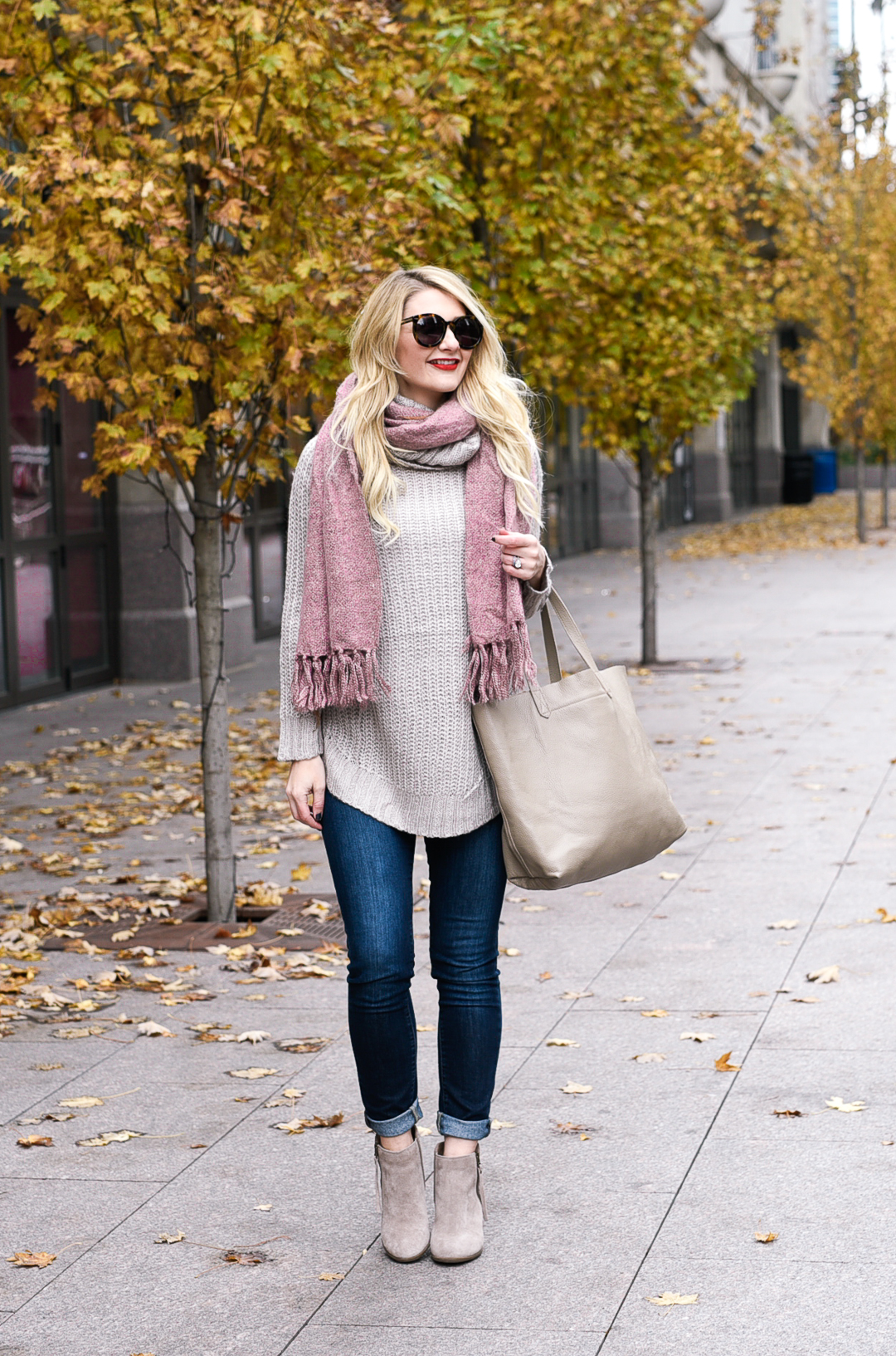 A casual weekend look with a taupe cowl neck tunic and fringe booties by Sole Society. 