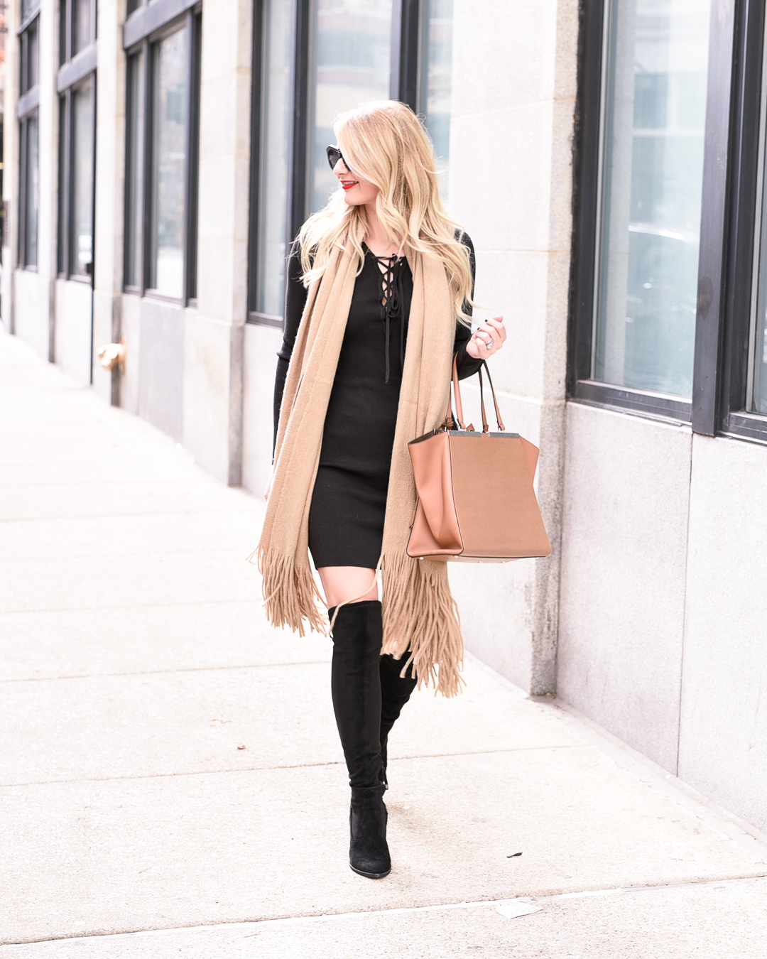 Over the knee boots in black and the perfect dress for date night.