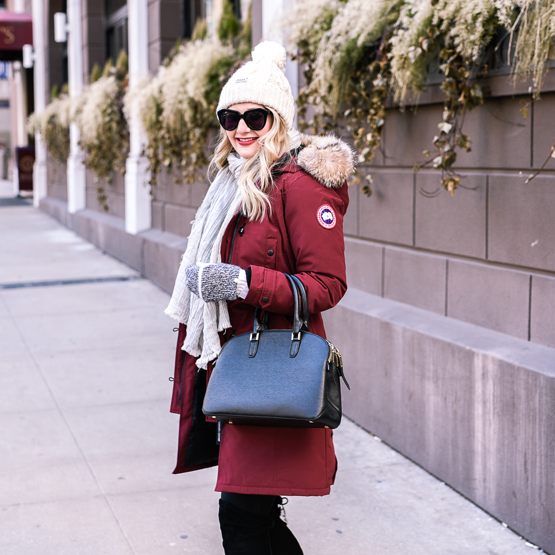 Jenna Colgrove wearing the Canada Goose Kensington coat in Niagra Grape. 