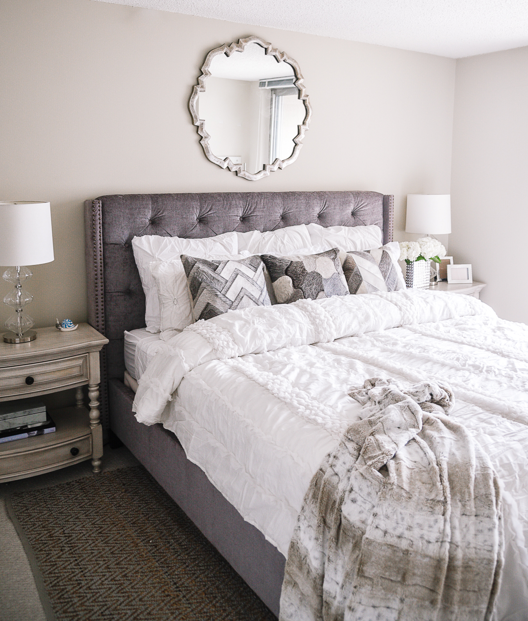 A grey and white master bedroom design. - Our Master Bedroom Linen Refresh with Home Decorators by Chicago style blogger Visions of Vogue