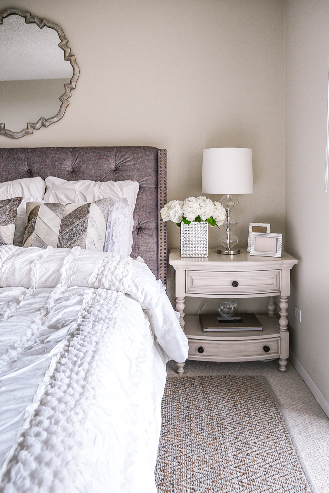 Grey nightstand with hydrangeas and a mirrored vase. - Our Master Bedroom Linen Refresh with Home Decorators by Chicago style blogger Visions of Vogue