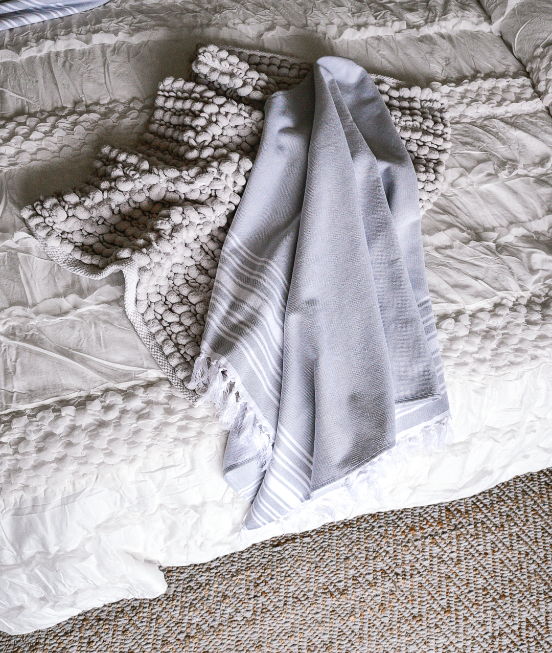 Grey bubbled bath mat and turkish linen towels - Our Master Bedroom Linen Refresh with Home Decorators by Chicago style blogger Visions of Vogue