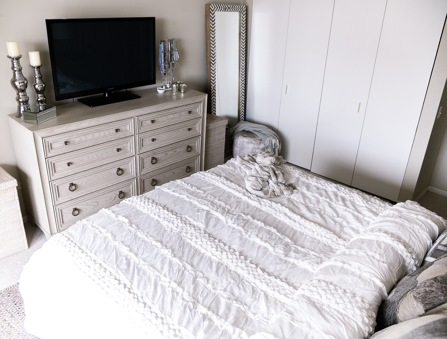 Pretty white textured bedding. - Our Master Bedroom Linen Refresh with Home Decorators by Chicago style blogger Visions of Vogue