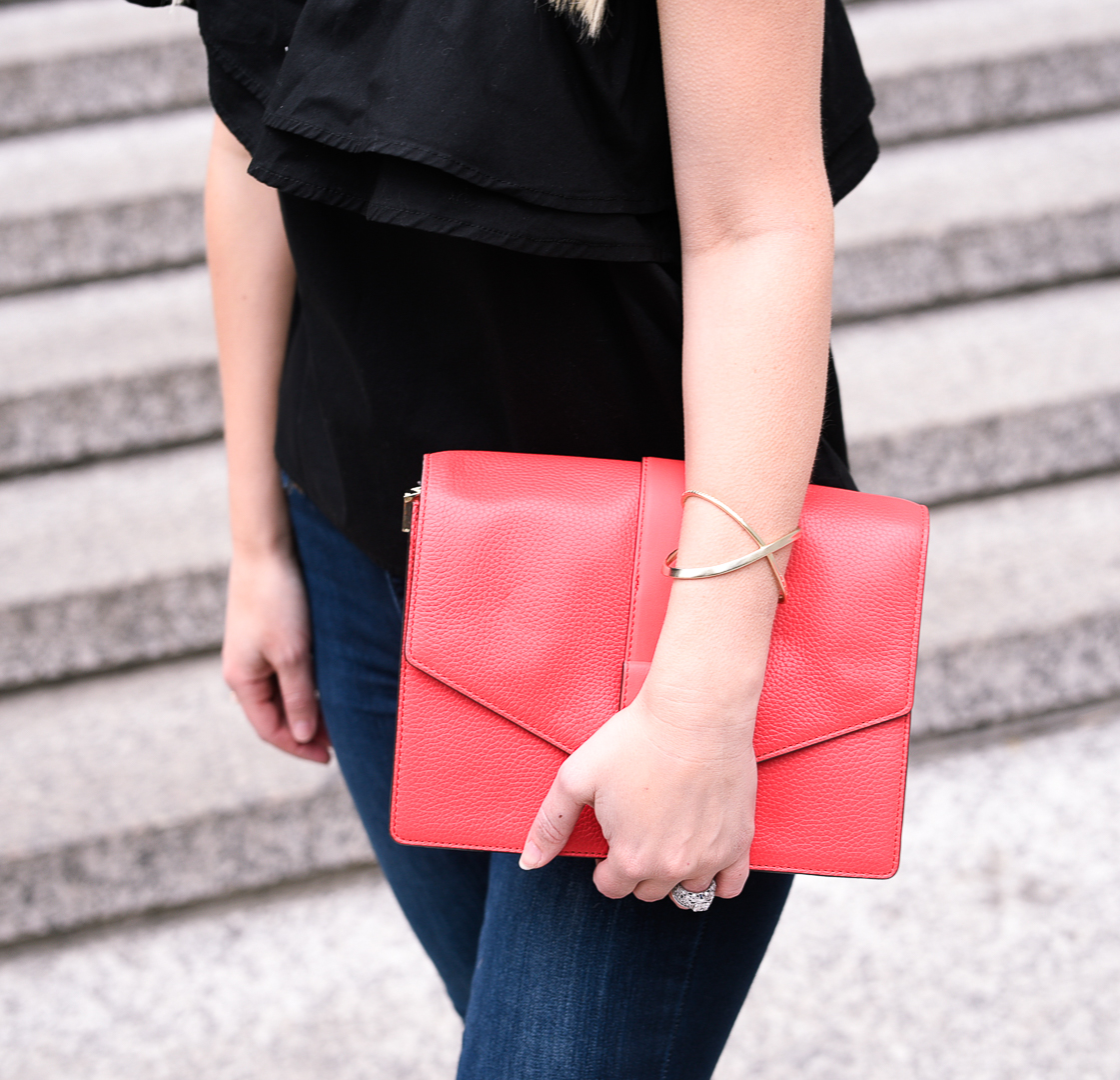 Red Kate Spade crossbody bag. 