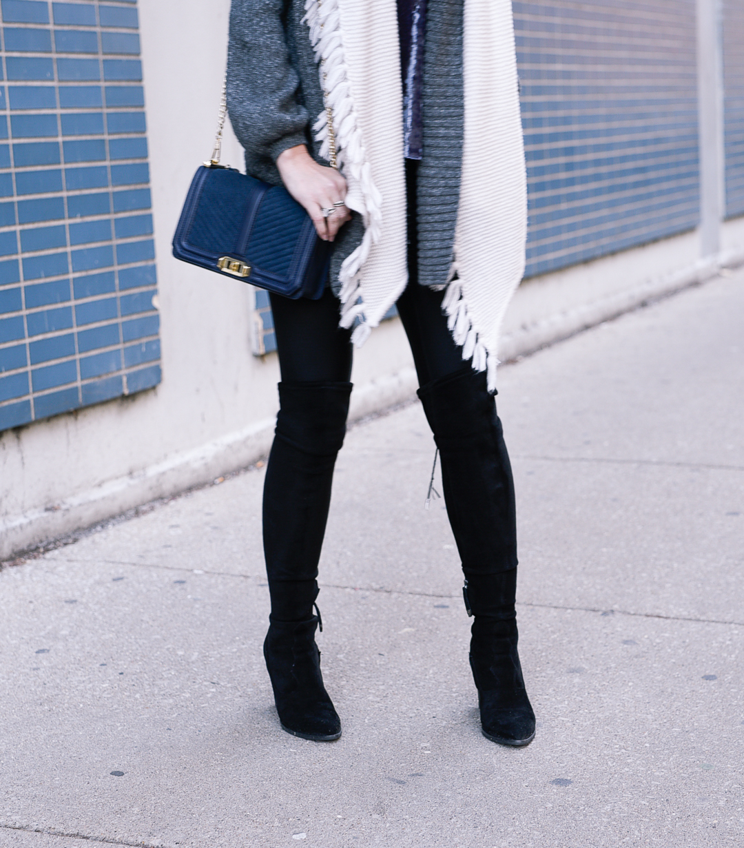 Black suede over the knee boots are so flattering! 