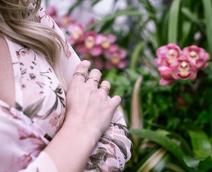 Mejuri gold stacking rings and flowers. 