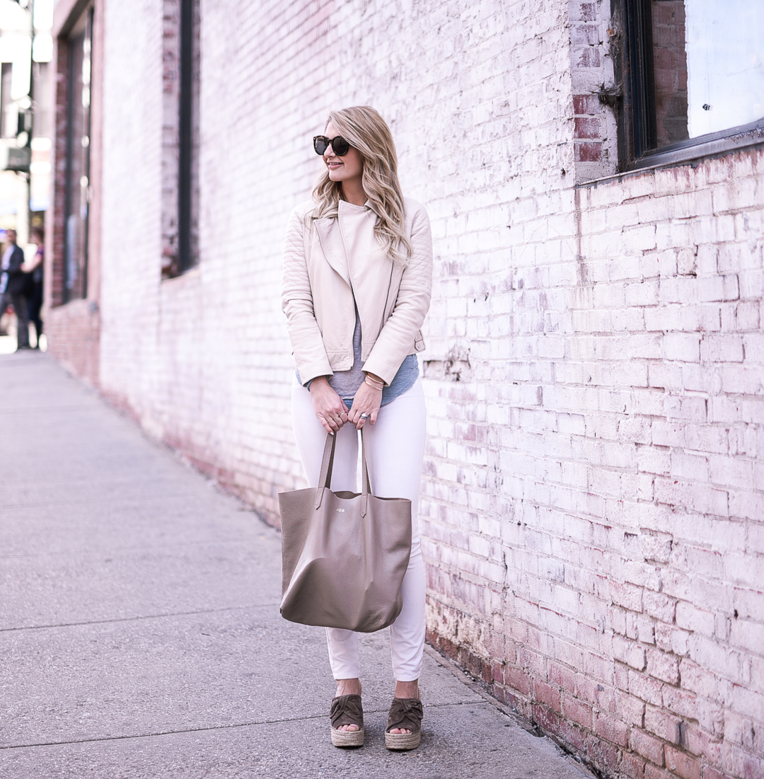 Comfortable weekend outfit with a white leather moto jacket. 