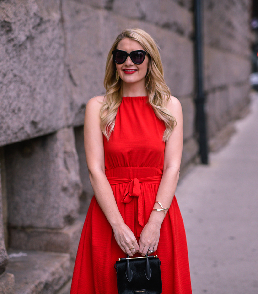 Red halter dress with a wrap waist. 