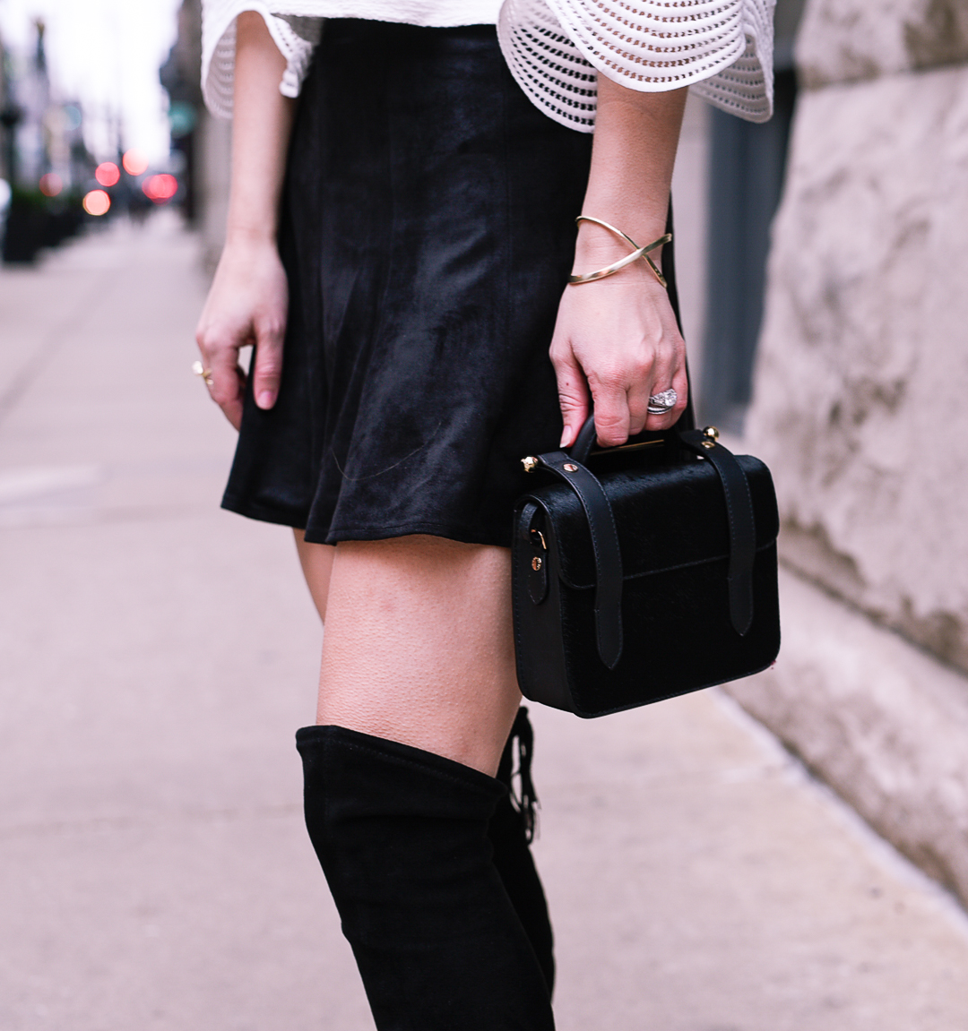 black nano crossbody bag by strathberry 