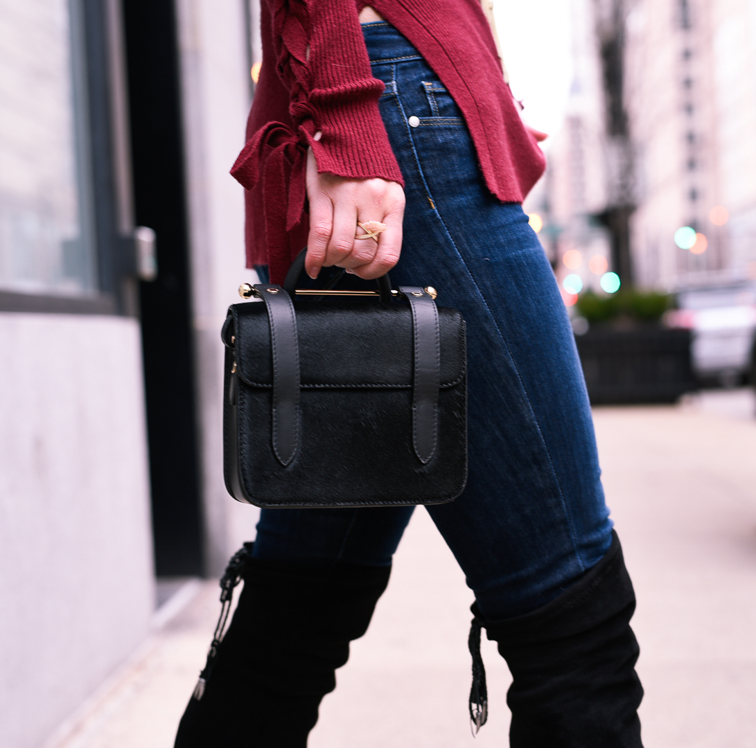 Strathberry Nano Calf Hair in black crossbody.