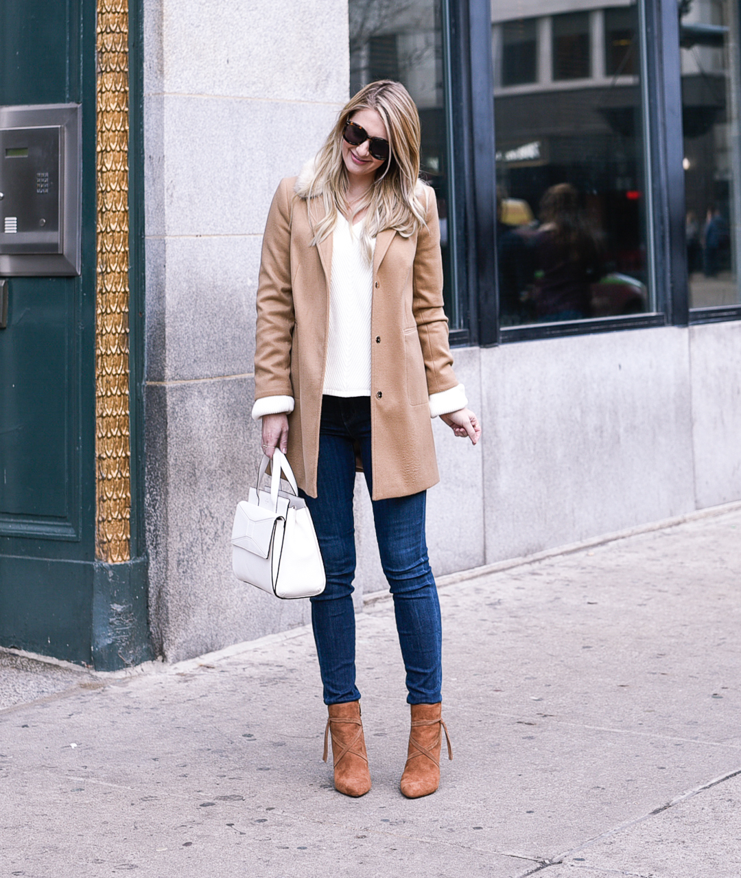 Topshop Faux Fur Collar Coat in camel and high waisted skinny jeans.