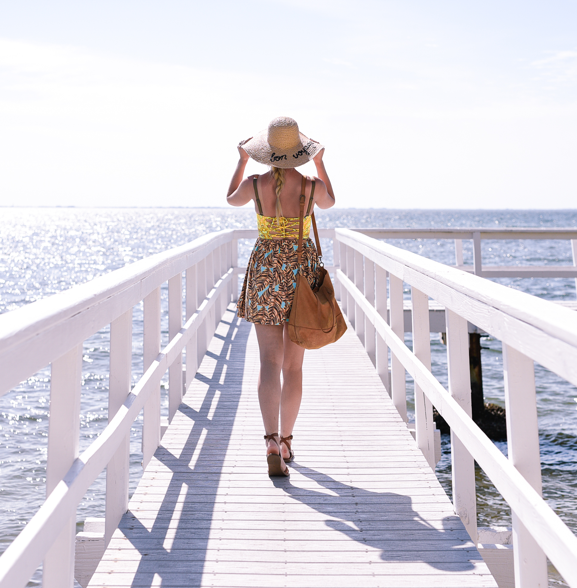 Beach coverup dress and a wide brim hat.