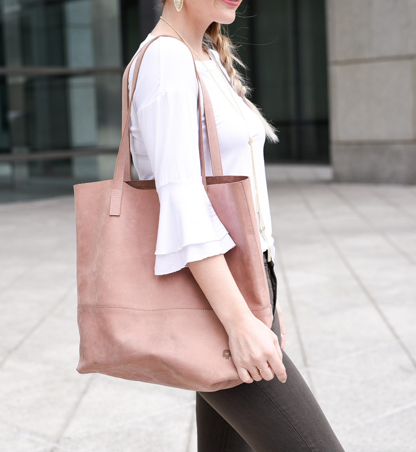 White bell sleeved top with tiered ruffles. 