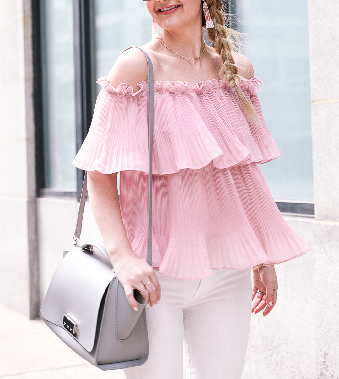 Twirling in a chiffon ruffled top. 