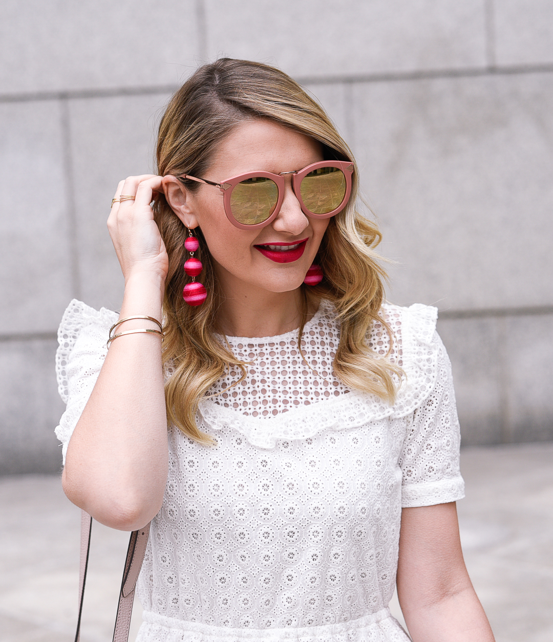 Baublebar Crispin earrings in neon pink with Karen Walker Superstar sunglasses. 