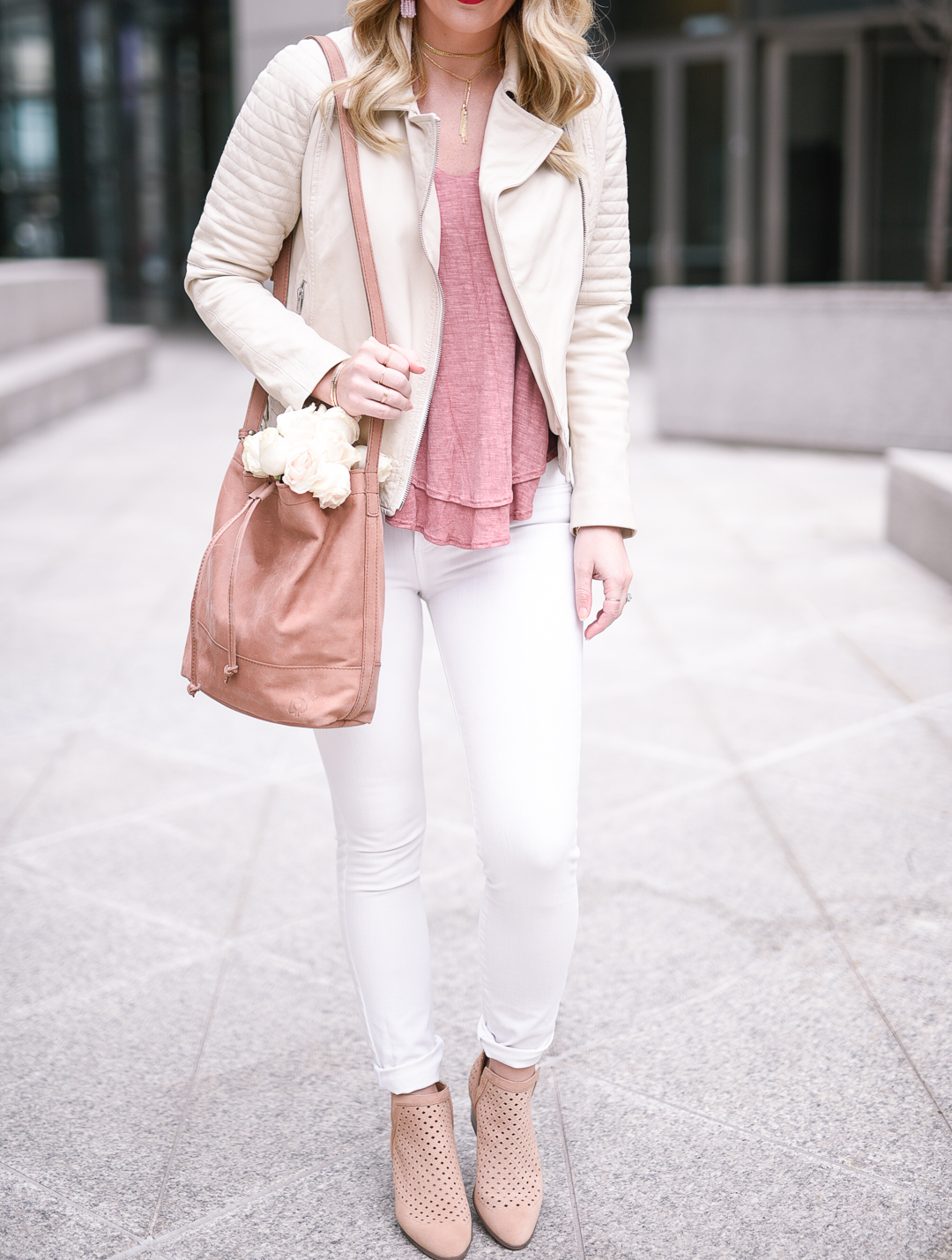 Neutral spring outfit with blush and ivory accents. 