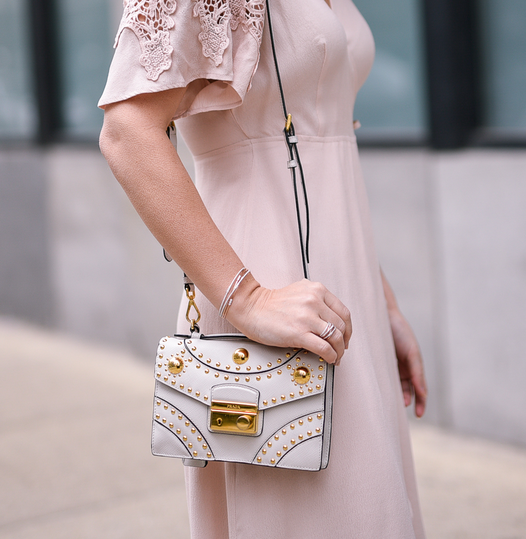 Gold studded white leather prada crossbody. 