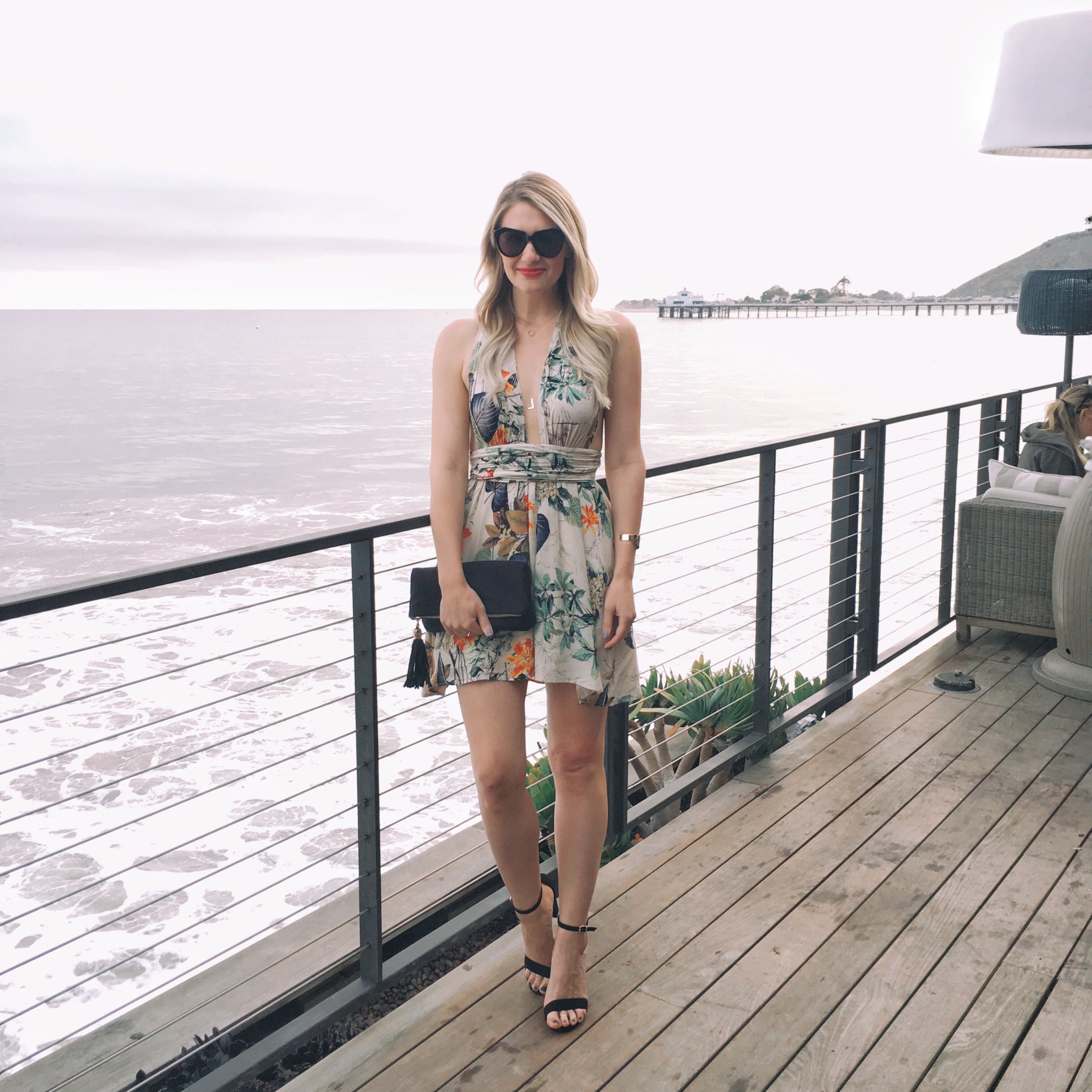 Wearing a floral dress at Nobu sushi restaurant in Malibu, Los Angeles