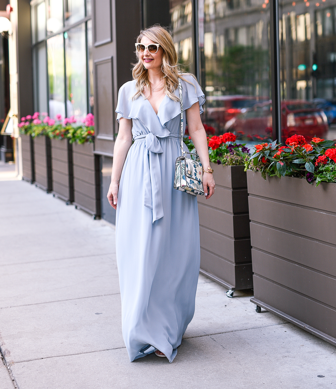 Ruffled light blue maxi dress with a bow waist