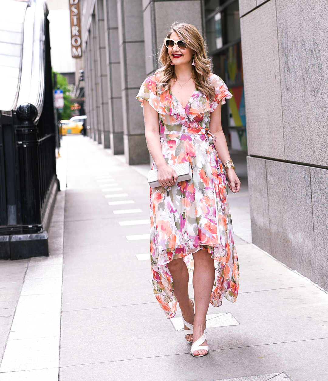 baublebar pink tassel earrings and a floral wrap dress 