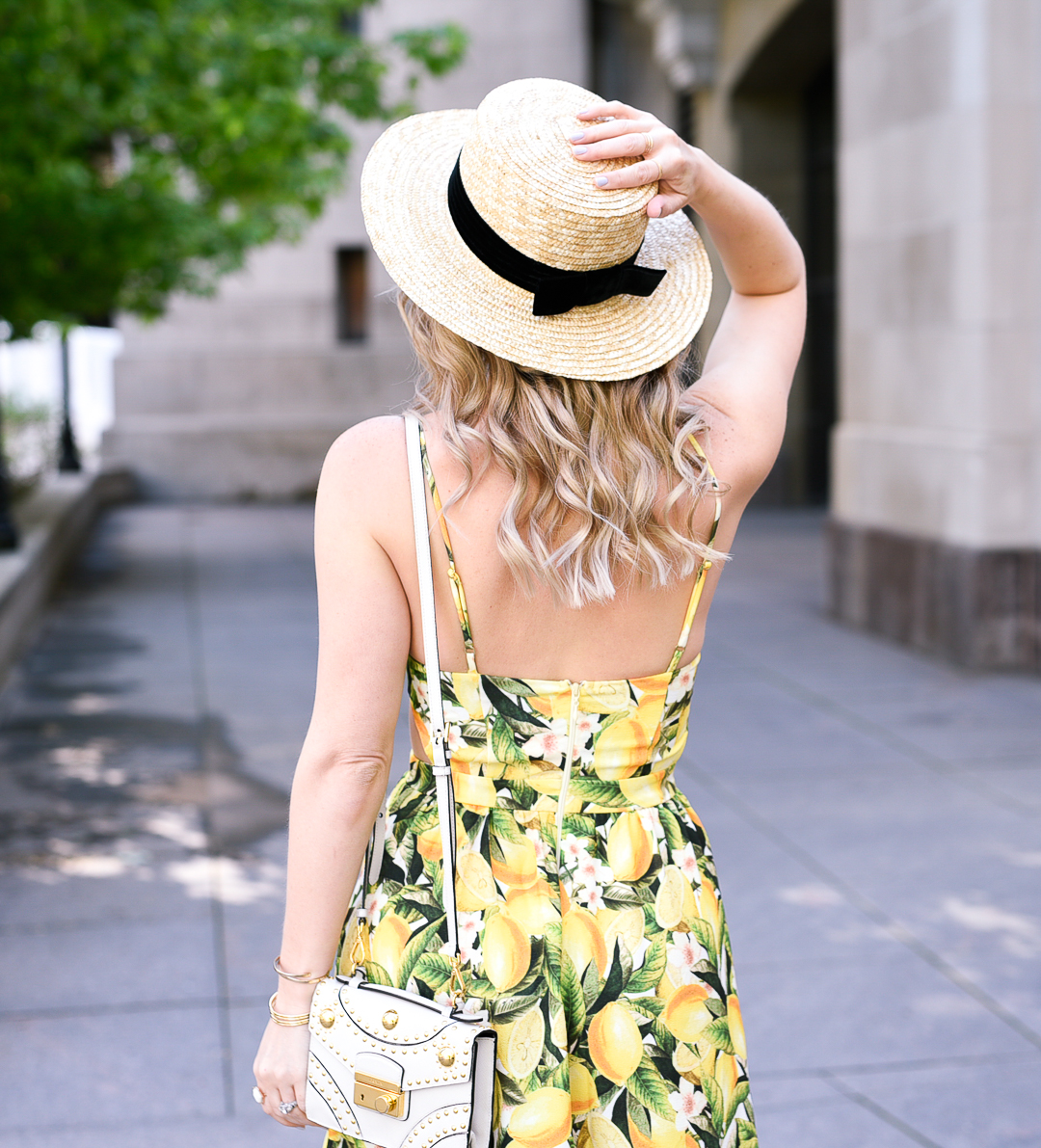 straw hat with a black ribbon for summer