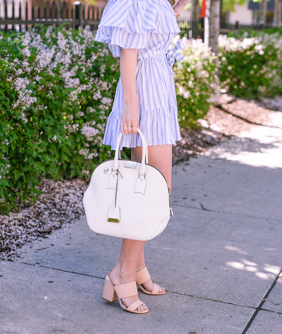 white leather burberry bag and dolce vita eliza mules