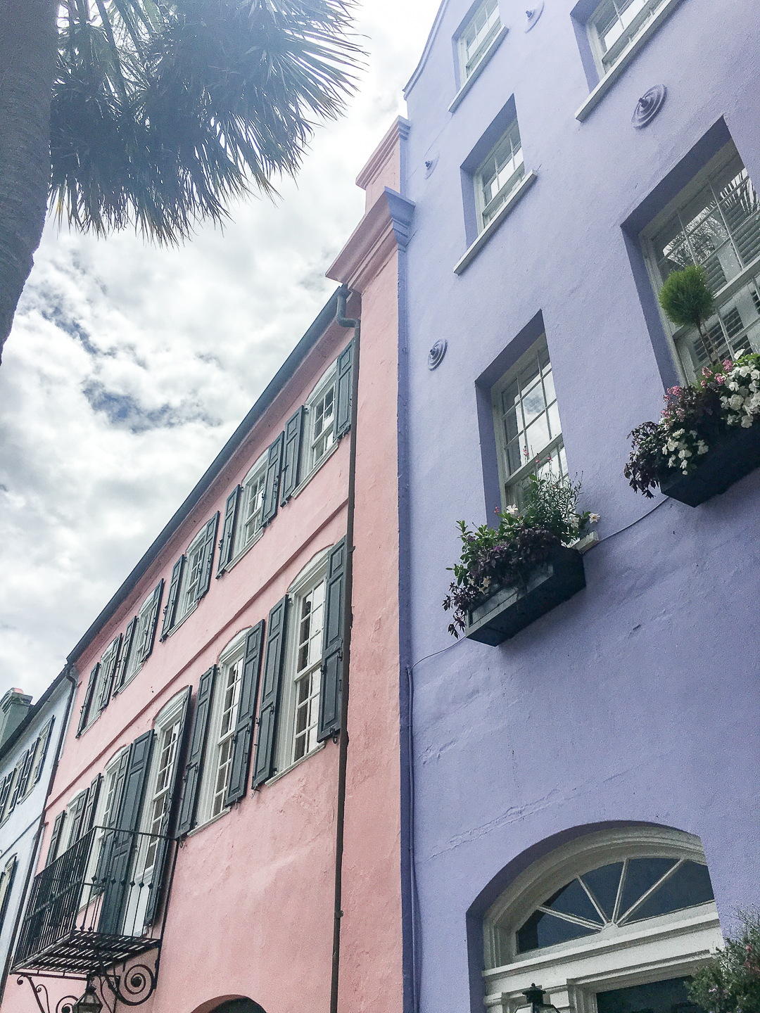 pink and purple house on rainbow row