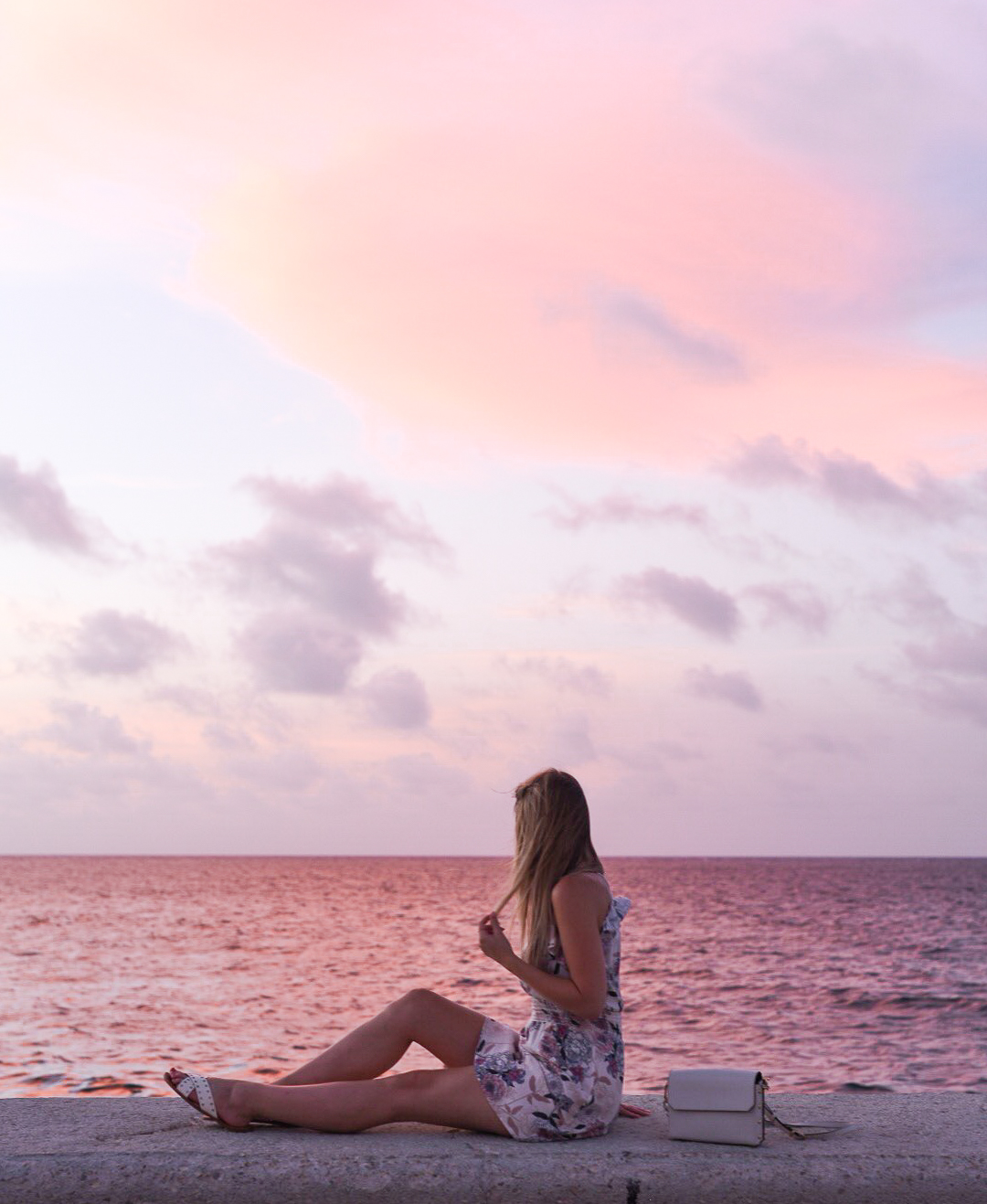 sunset at malecon in havana cuba