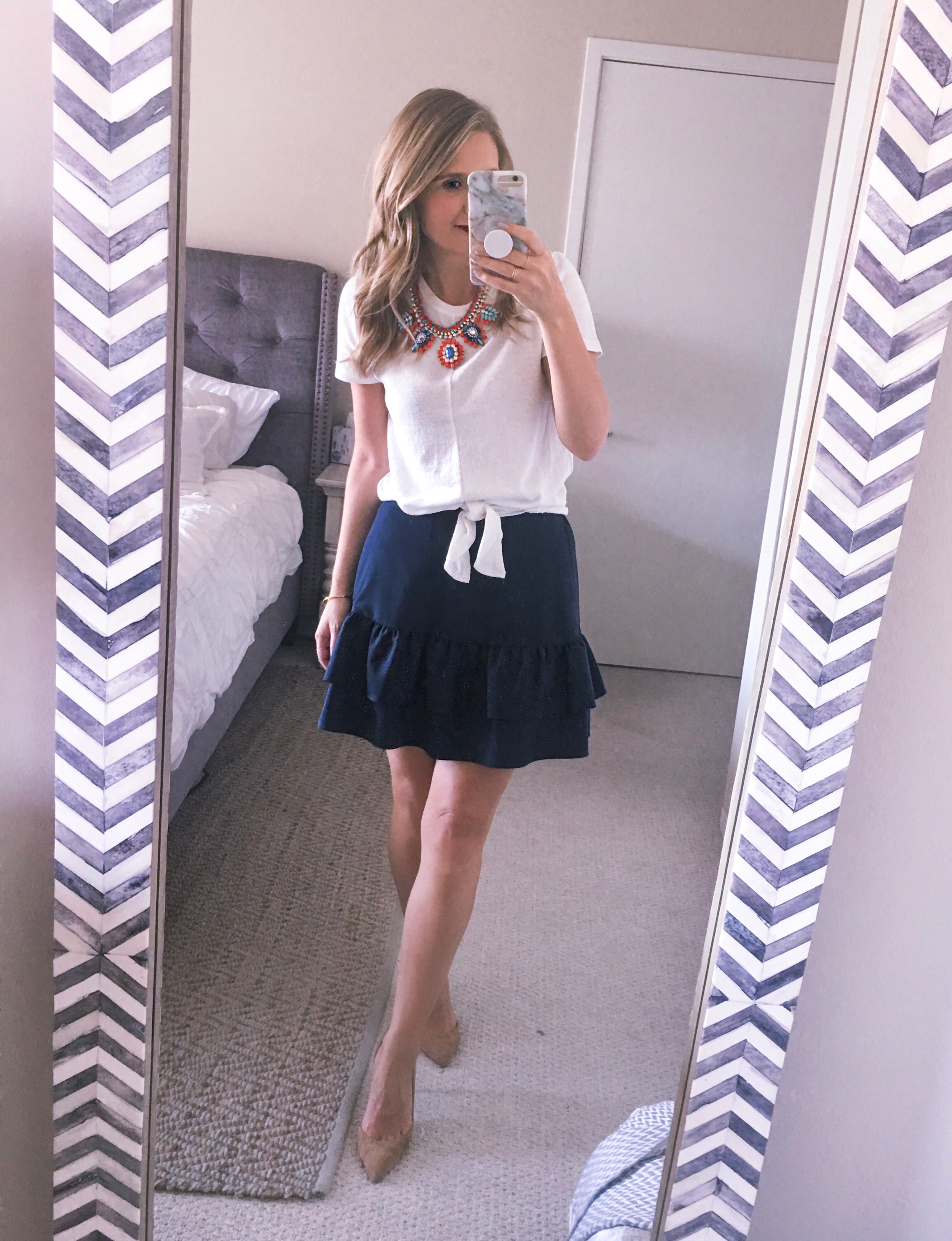 navy ruffle skirt with a tie front tee
