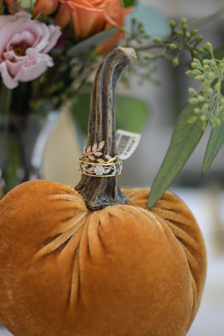 pumpkins decorated with jewelry