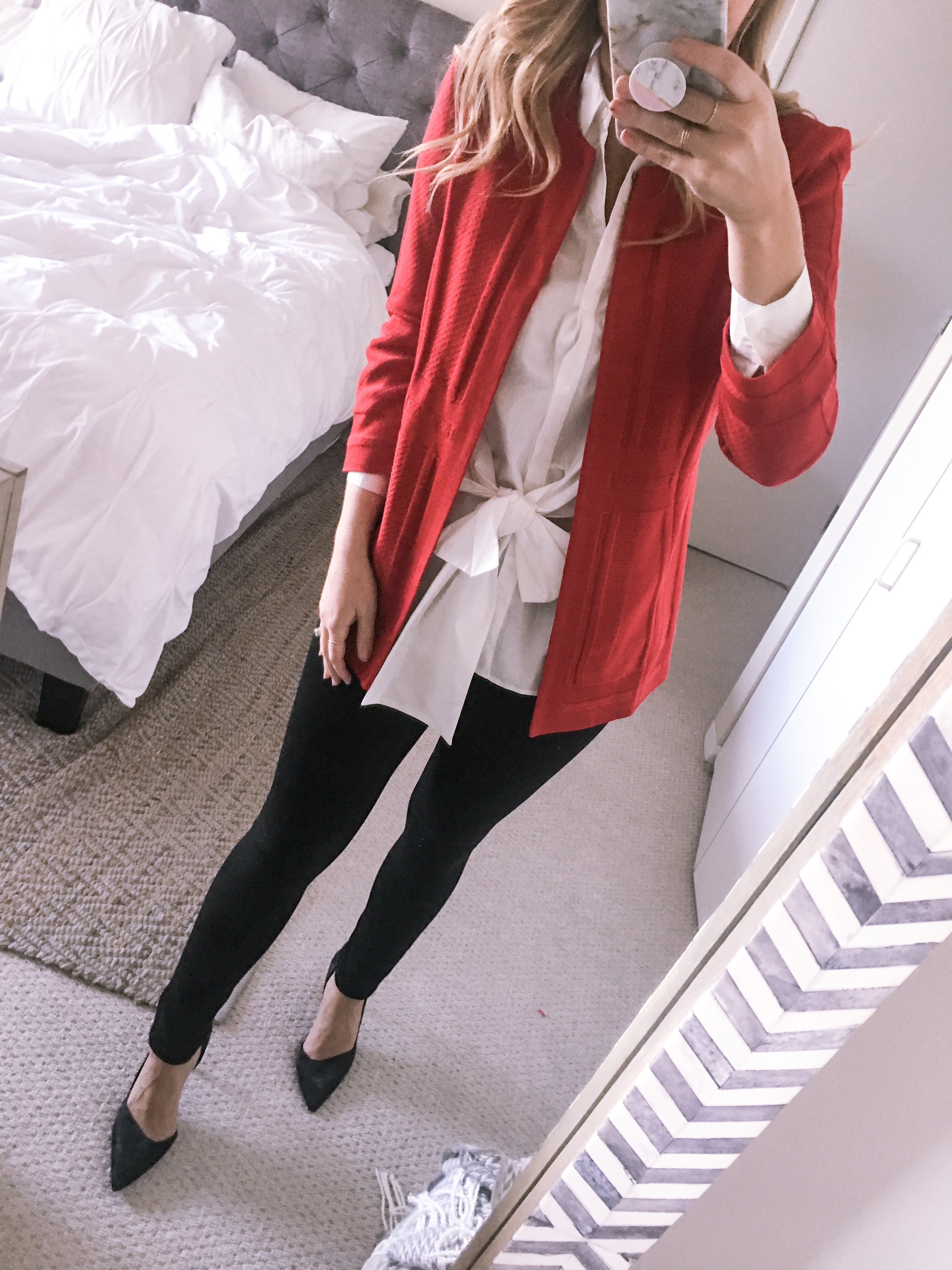 red blazer with a white bow top