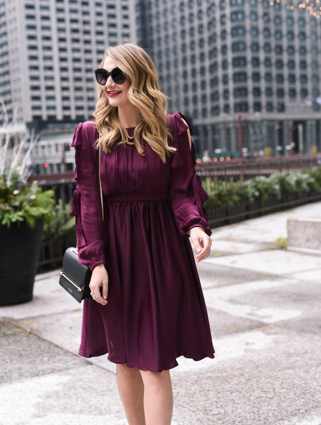 what to wear to an office holiday party - Burgundy Holiday Dress by Chicago fashion blogger Visions of Vogue