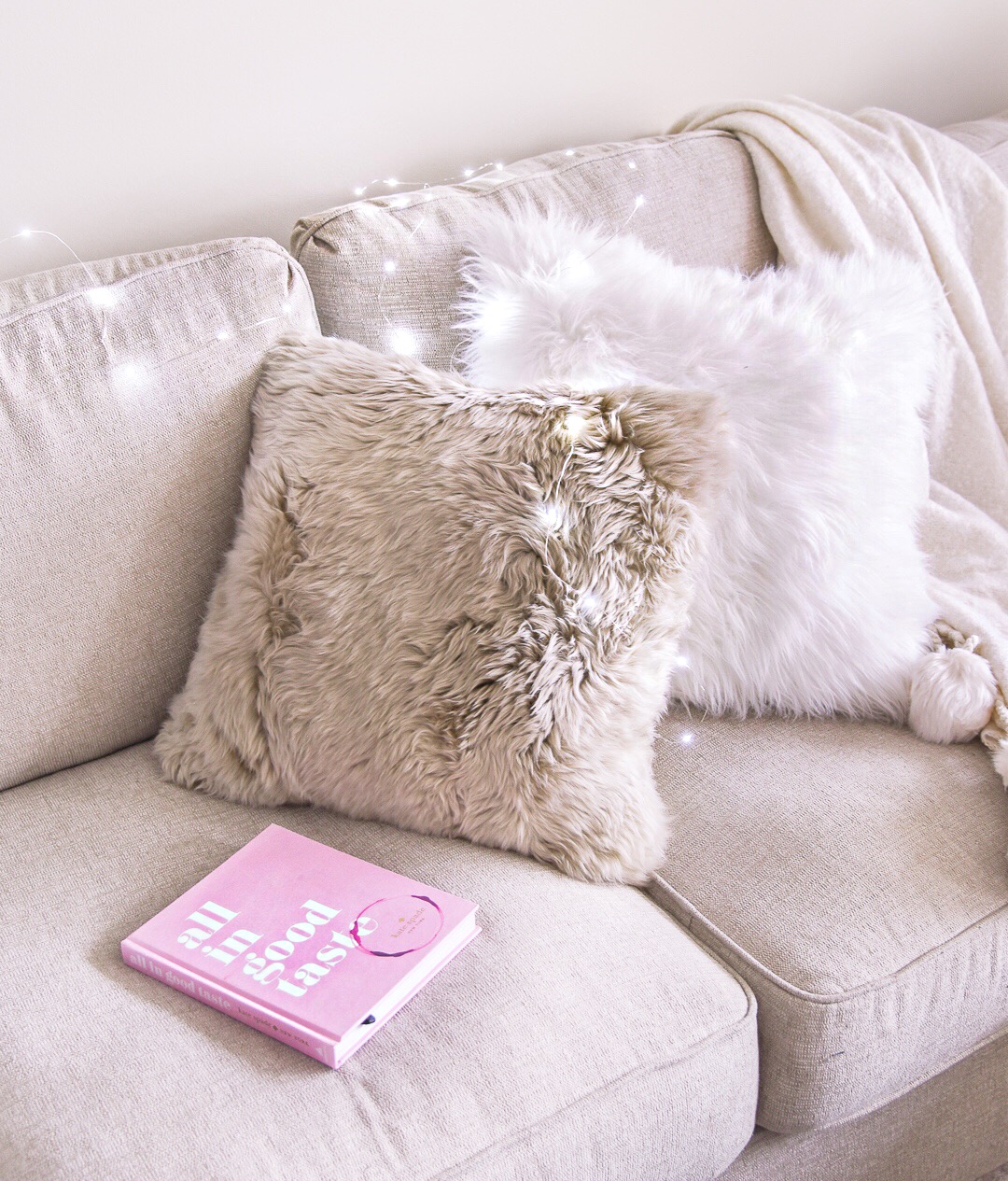 faux fur sherpa pillow to decorate your living room - how to decorate a cozy home by Chicago style blogger Visions of Vogue