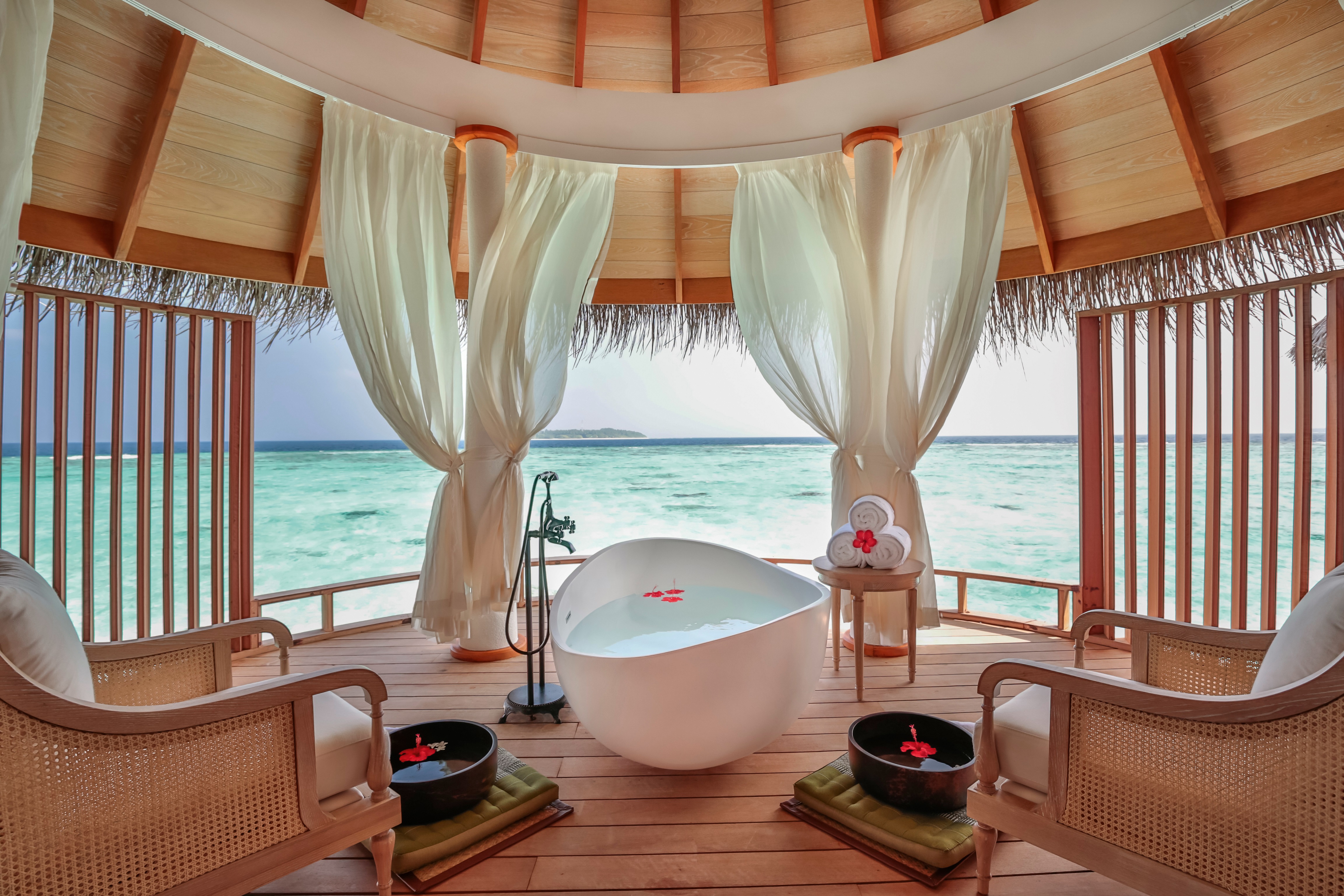 foot massage at a luxury resort in the maldives - Maldives Resort Review: Milaidhoo by popular Chicago blogger Visions of Vogue