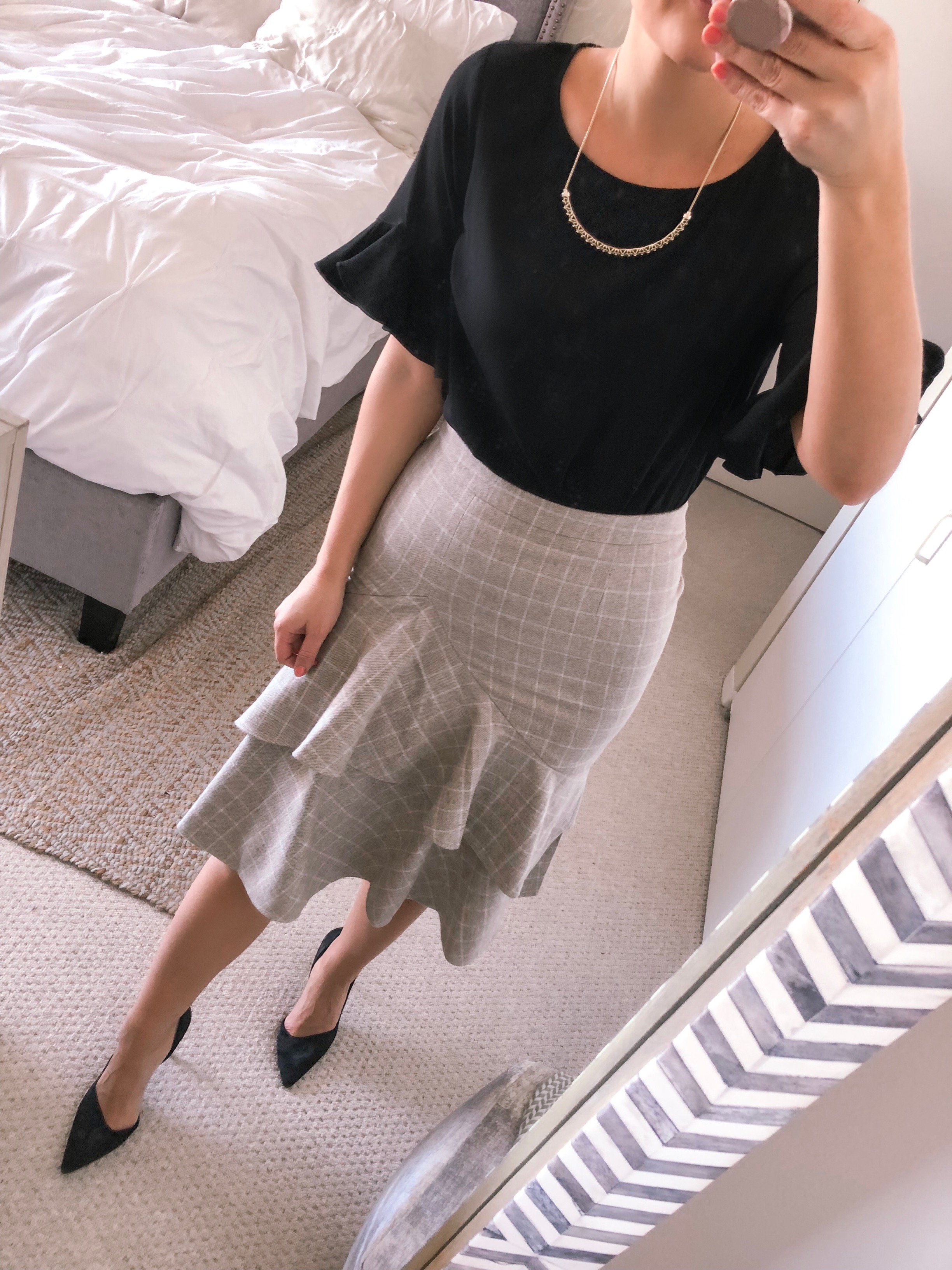 Black ruffle top and windowpane ruffles skirt