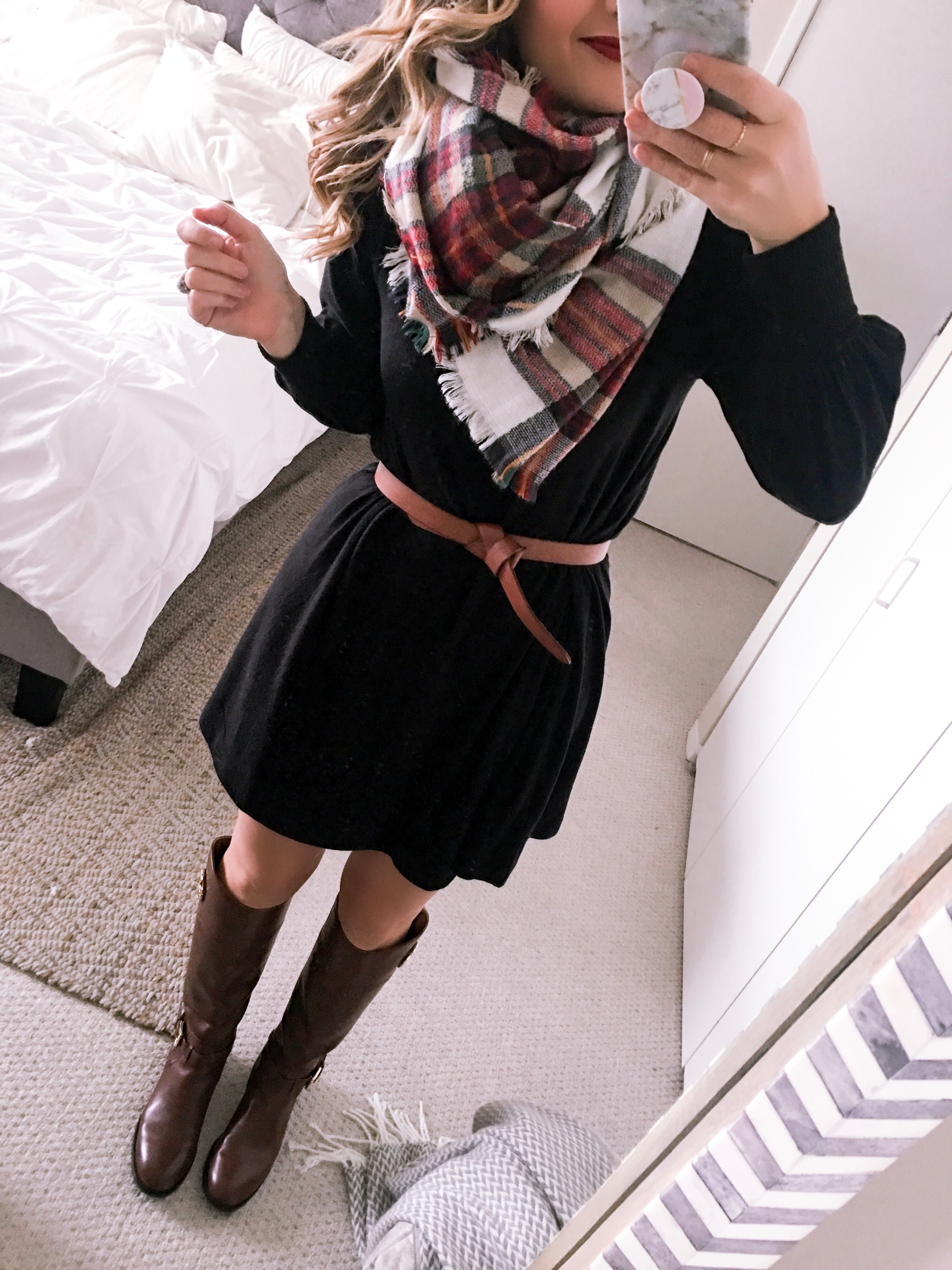 black knit dress and brown riding boots