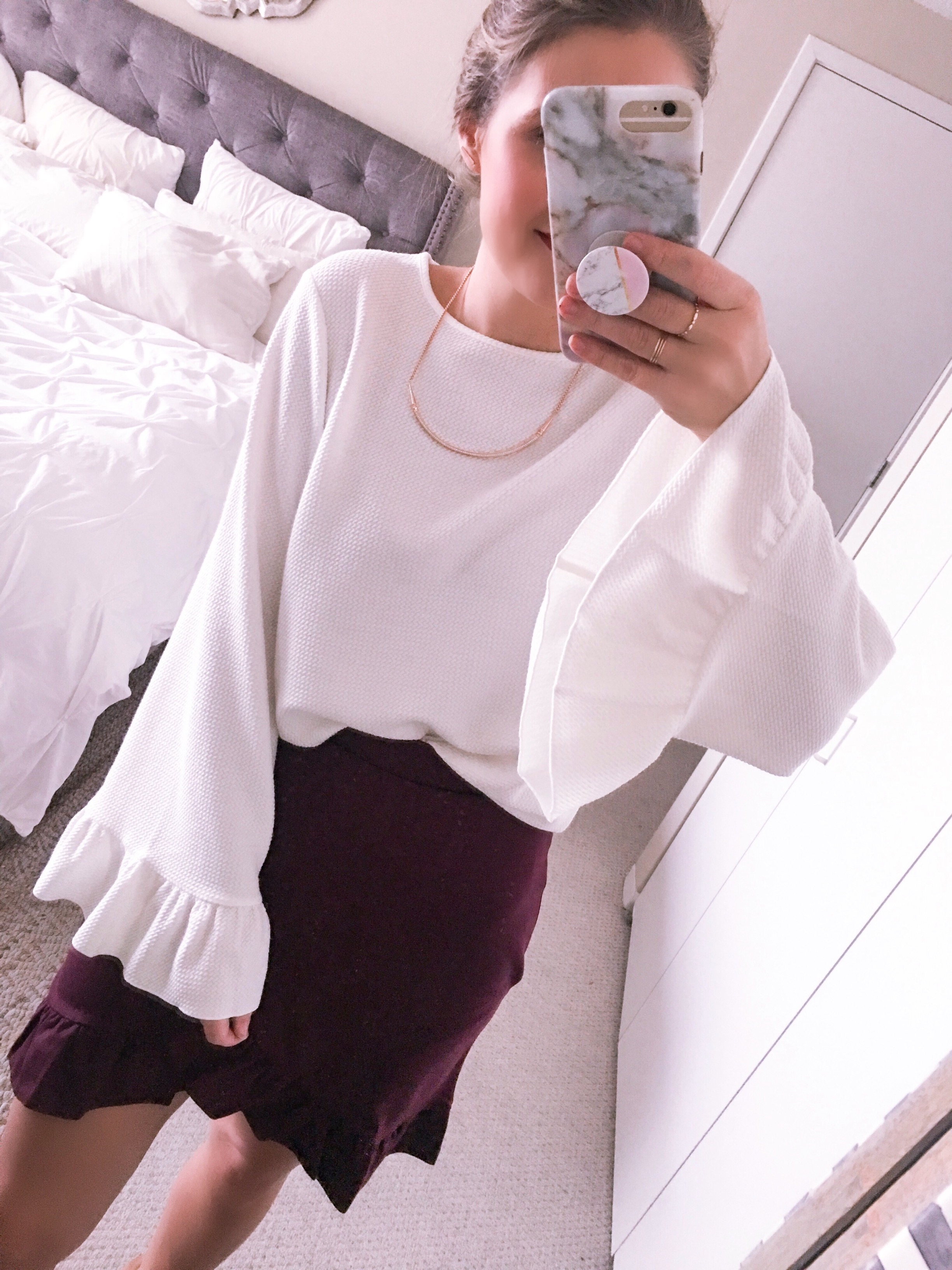white bell sleeve top with a burgundy skirt - January Instagram Fashion Roundup (15 Outfits) by popular Chicago fashion blogger Visions of Vogue