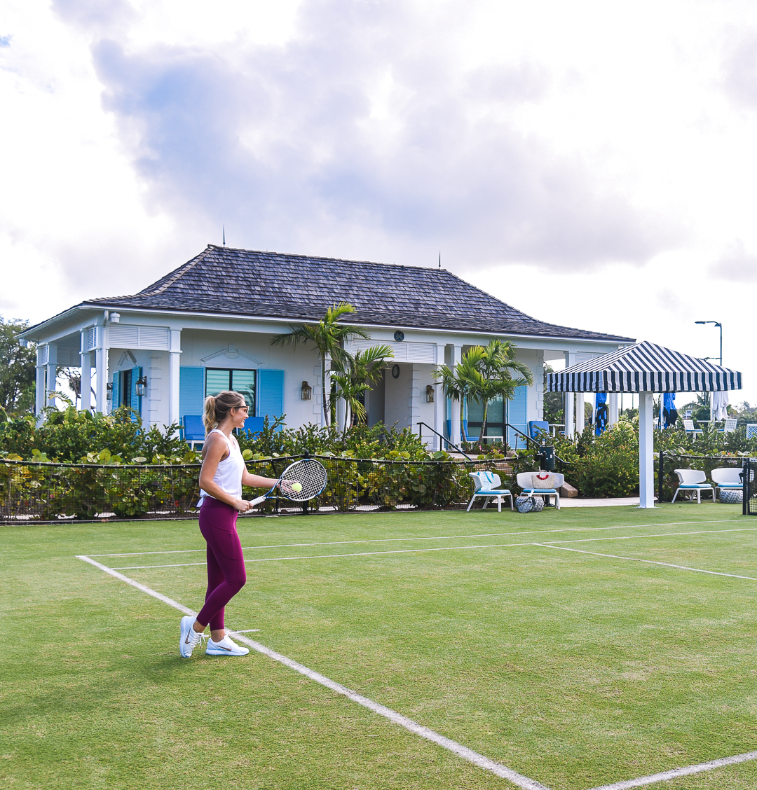playing tennis on grass at the racquet club in the bahamas