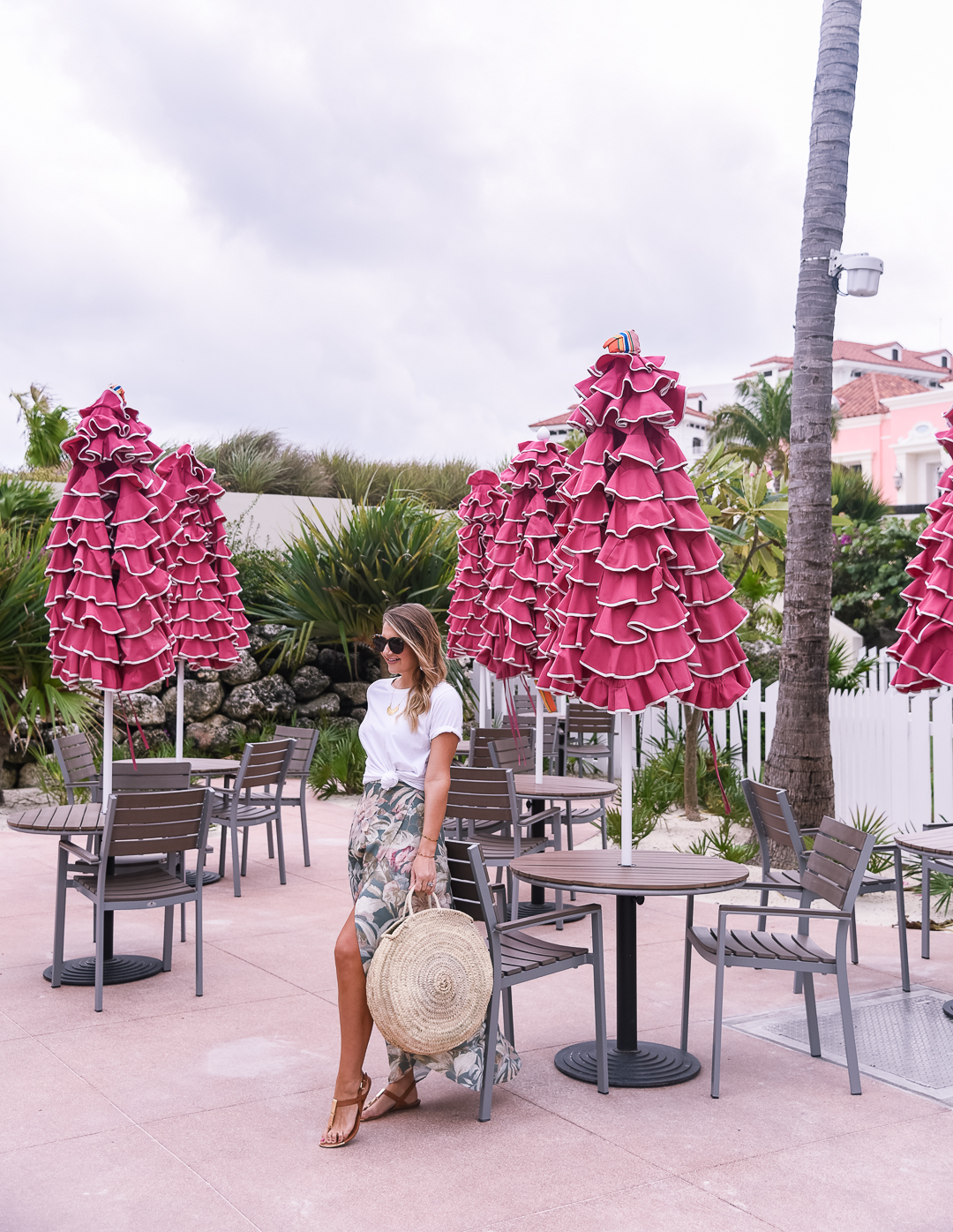 pink flamingo umbrellas at baha mar - baha mar resort review in the bahamas by popular Chicago travel blogger Visions of Vogue