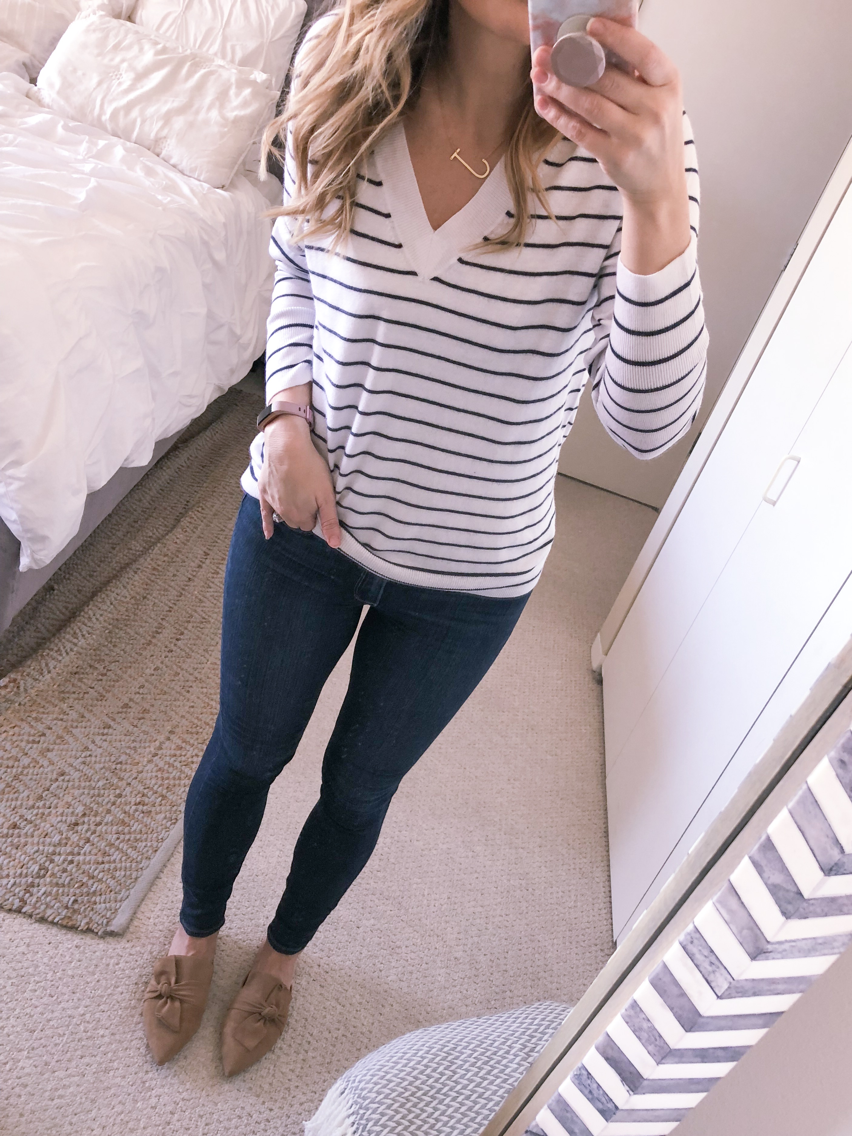 striped v-neck sweater and high waist skinny jeans